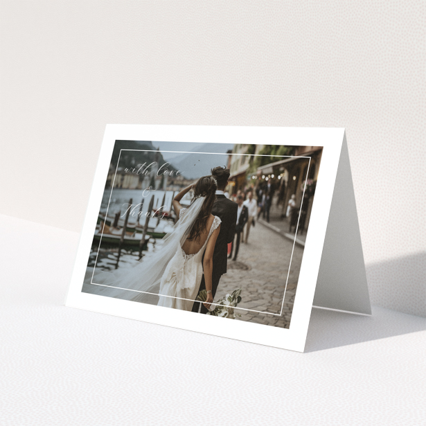 Wedding thank you card with one photo featuring a couple walking by a lakeside with the text with love and thanks