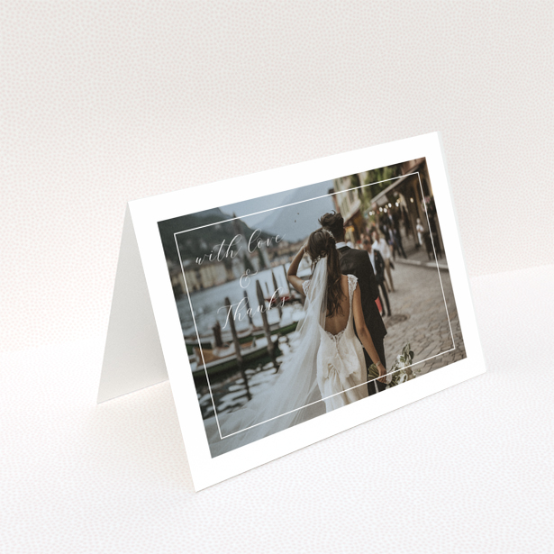 Wedding thank you card with one photo featuring a couple walking by a lakeside with the text with love and thanks