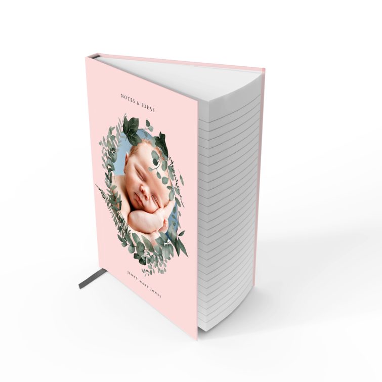 Personalised baby photo notebook design with pink floral cover, featuring one photo.