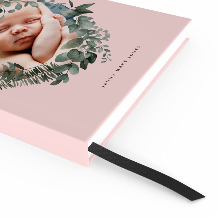 Personalised baby photo notebook design with pink floral cover, featuring one photo.