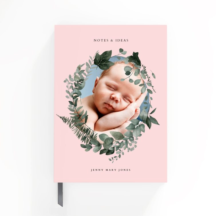 Personalised baby photo notebook design with pink floral cover, featuring one photo.