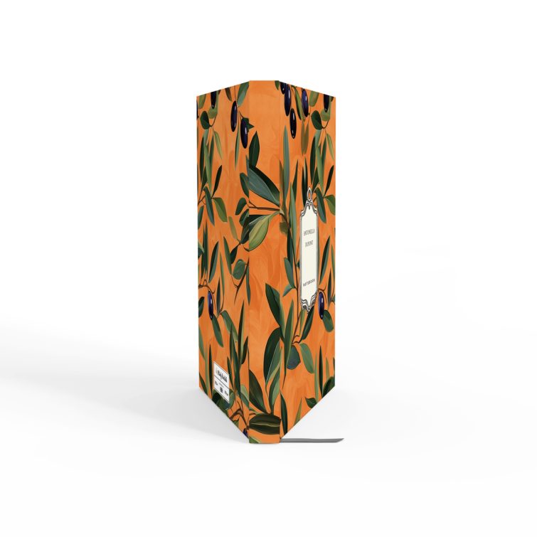 Floral orange notebook cover design with olive branch pattern, featuring two decorative photo elements.