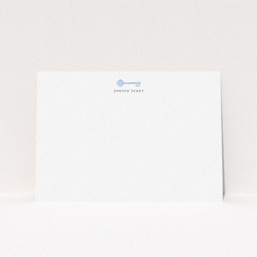 A mens correspondence card named "The magic key". It is an A6 card in a landscape orientation. "The magic key" is available as a flat card, with tones of white and blue.