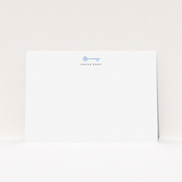 A mens correspondence card named "The magic key". It is an A6 card in a landscape orientation. "The magic key" is available as a flat card, with tones of white and blue.