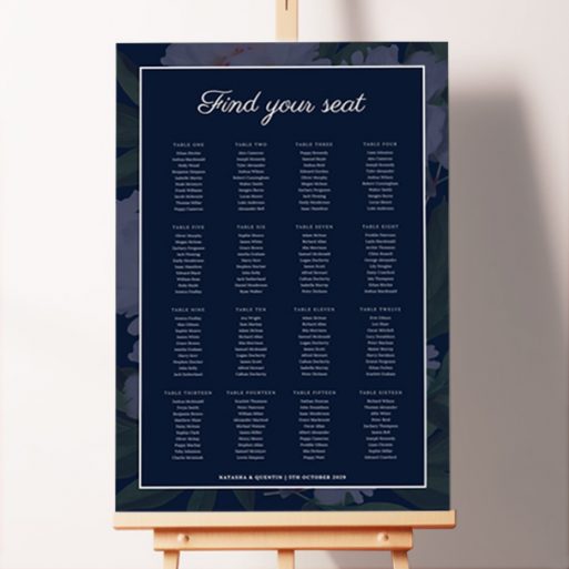 Bespoke Midnight Blooms Seating Charts featuring a dark and elegant design with muted floral illustrations that stand out against the deep navy blue background, adding a touch of elegance and allure to your wedding ambiance.. This design shows 16 tables.