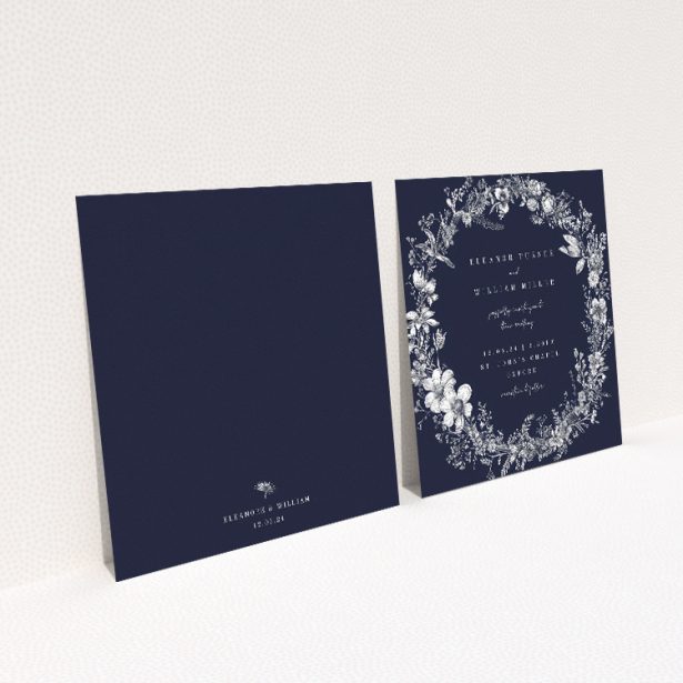 "Midnight Mayfair Florals" wedding invitation featuring a white botanical illustration on a deep navy background, evoking the allure of a starlit evening This image shows the front and back sides together