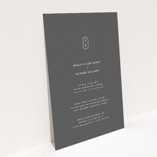 Sleek A5 wedding invitation design featuring the 'Midnight Monogram' monogram against a matte grey background. This image shows the front and back sides together