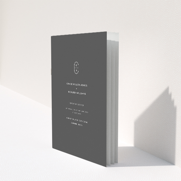 "Midnight Monogram wedding order of service booklet featuring sleek modern design with bold monochromatic colour scheme and personalised monogram emblem.". This image shows the front and back sides together