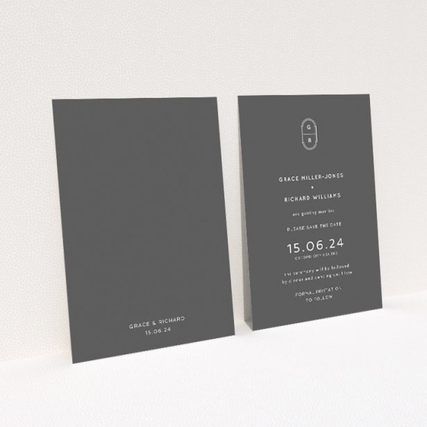 Midnight Monogram wedding save the date card with elegant monogram and contemporary typography on deep charcoal backdrop. This is a view of the back