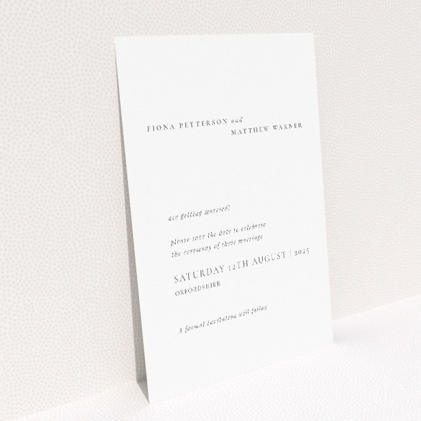 Minimalist Elegance wedding save the date card with clean layout, classic serif font for couple's names, and prominent display of the date. This is a view of the back