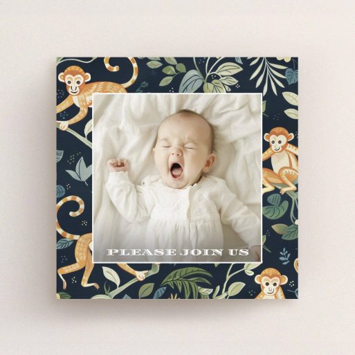 Monkey Themed Christening Christening invitation design featuring a baby photo and monkey pattern with floral elements