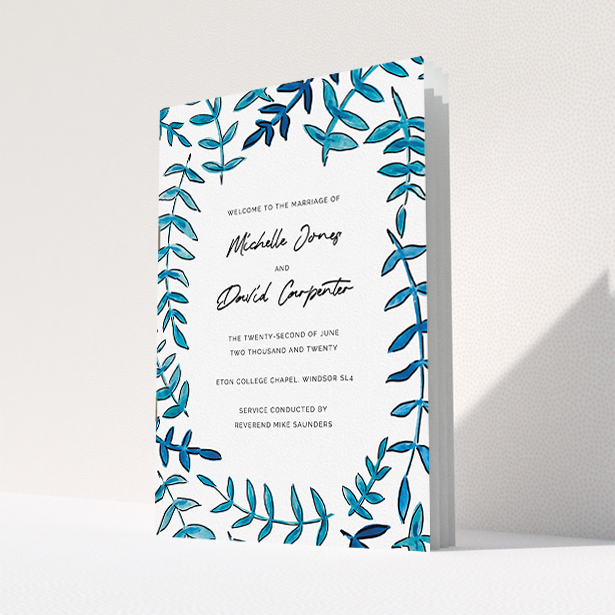 A multipage wedding order of service design named "Modern Blue Floral Swirl". It is an A5 booklet in a portrait orientation. "Modern Blue Floral Swirl" is available as a folded booklet booklet, with tones of blue and white.