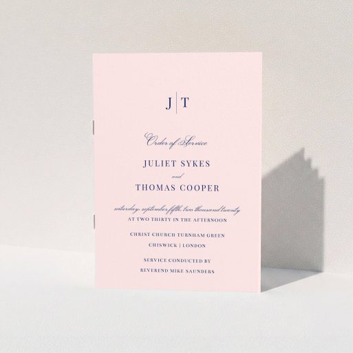A multipage wedding order of service design titled "Monogrammed Pink". It is an A5 booklet in a portrait orientation. "Monogrammed Pink" is available as a folded booklet booklet, with mainly pink colouring.