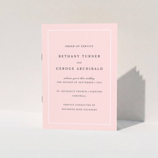 A multipage wedding order of service named "Salmon Pink Classic". It is an A5 booklet in a portrait orientation. "Salmon Pink Classic" is available as a folded booklet booklet, with tones of pink and white.