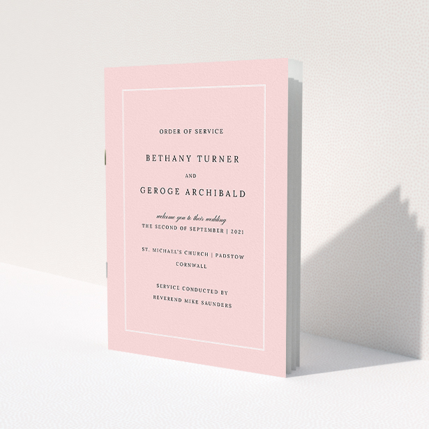 A multipage wedding order of service named 'Salmon Pink Classic'. It is an A5 booklet in a portrait orientation. 'Salmon Pink Classic' is available as a folded booklet booklet, with tones of pink and white.