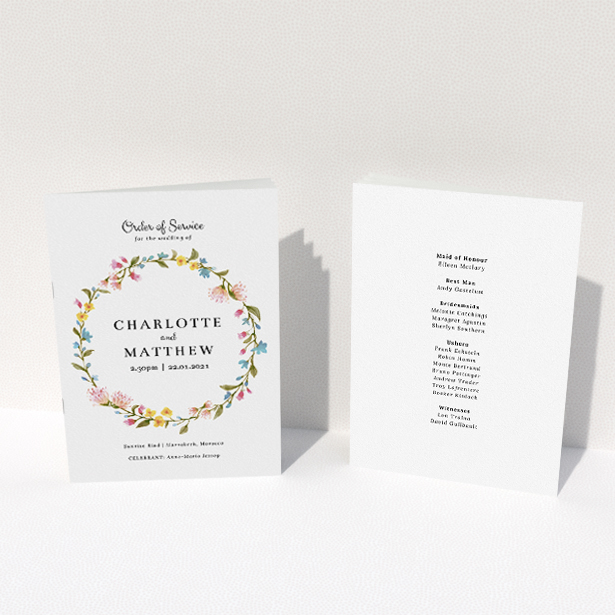 A multipage wedding order of service template titled "Spring Wedding Wreath". It is an A5 booklet in a portrait orientation. "Spring Wedding Wreath" is available as a folded booklet booklet, with mainly pink colouring.
