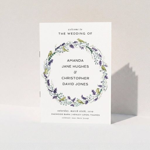 Multi-page Wedding Order of Service Design - "Vintage Floral Wreath" A multipage wedding order of service design titled "Vintage Floral Wreath". It is an A5 booklet in a portrait orientation. "Vintage Floral Wreath" is available as a folded booklet booklet, with tones of off-white and dark green.