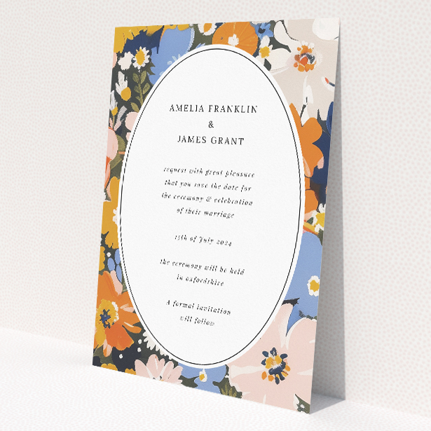 Navy and Marigold Space Save the Date Card - Contemporary floral pattern in marigold, navy, and soft blue tones surrounding a crisp white oval centre. Portrait orientation for readability and aesthetic pleasure This is a view of the back