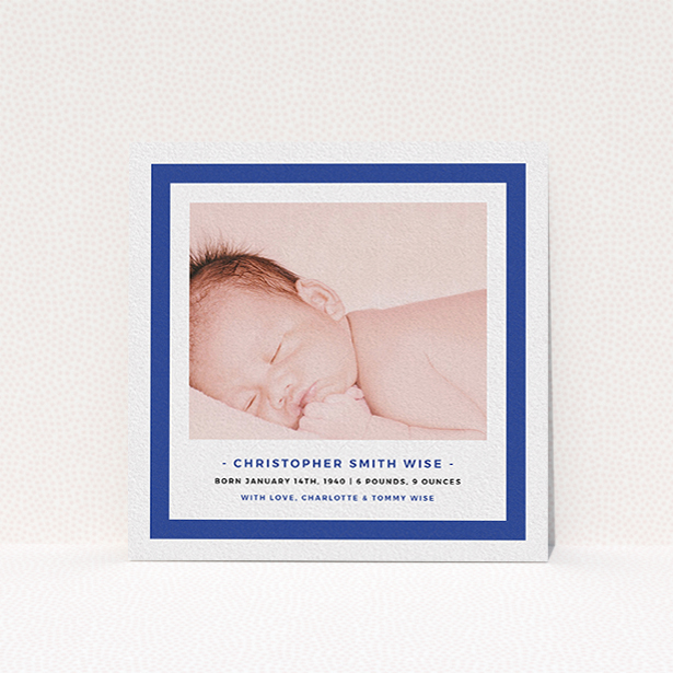 A new baby announcement card named "Big Blue". It is a square (148mm x 148mm) card in a square orientation. It is a photographic new baby announcement card with room for 1 photo. "Big Blue" is available as a flat card, with tones of blue and white.