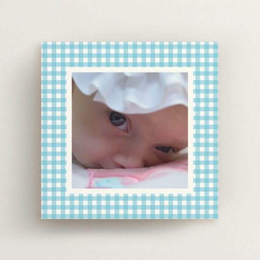 A new baby announcement card named "Blue Plaid". It is a square (148mm x 148mm) card in a square orientation. It is a photographic new baby announcement card with room for 1 photo. "Blue Plaid" is available as a flat card, with tones of blue and white.