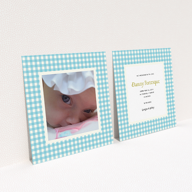 A new baby announcement card named "Blue Plaid". It is a square (148mm x 148mm) card in a square orientation. It is a photographic new baby announcement card with room for 1 photo. "Blue Plaid" is available as a flat card, with tones of blue and white.