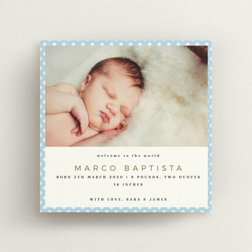 A new baby announcement card design named "Blue Polkadots". It is a square (148mm x 148mm) card in a square orientation. It is a photographic new baby announcement card with room for 1 photo. "Blue Polkadots" is available as a flat card, with tones of blue and white.