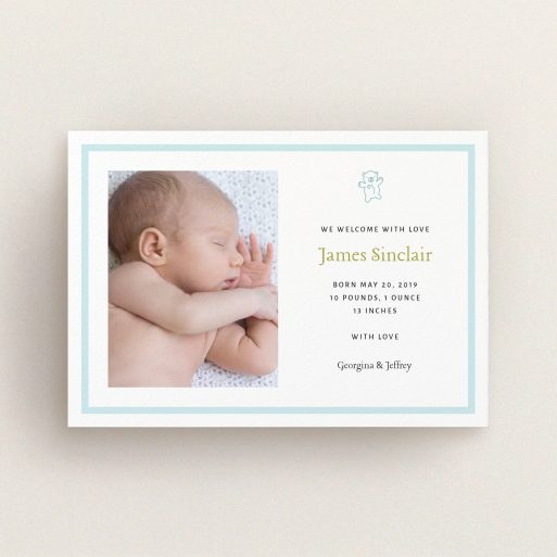 A new baby announcement card called "Blue Teddy". It is an A6 card in a landscape orientation. It is a photographic new baby announcement card with room for 1 photo. "Blue Teddy" is available as a flat card, with tones of blue and white.