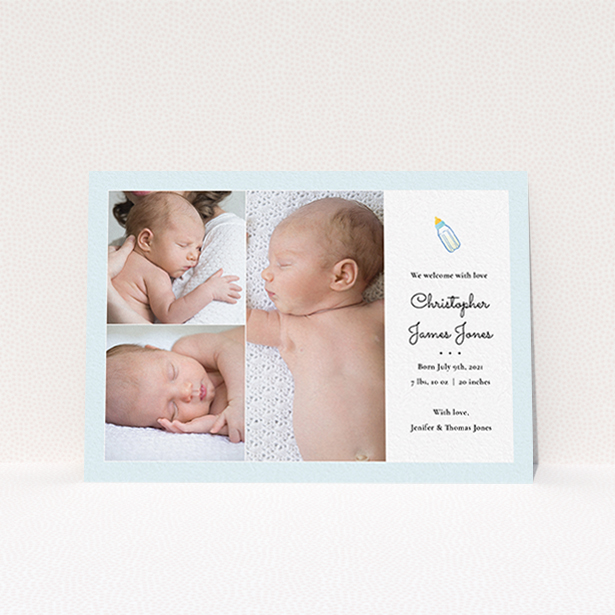 A new baby announcement card named "Bottled Up". It is an A6 card in a landscape orientation. It is a photographic new baby announcement card with room for 3 photos. "Bottled Up" is available as a flat card, with tones of blue and white.