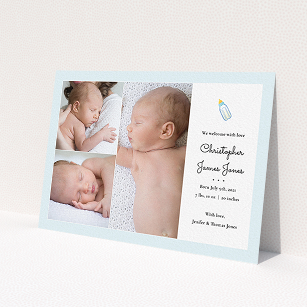 A new baby announcement card named 'Bottled Up'. It is an A6 card in a landscape orientation. It is a photographic new baby announcement card with room for 3 photos. 'Bottled Up' is available as a flat card, with tones of blue and white.