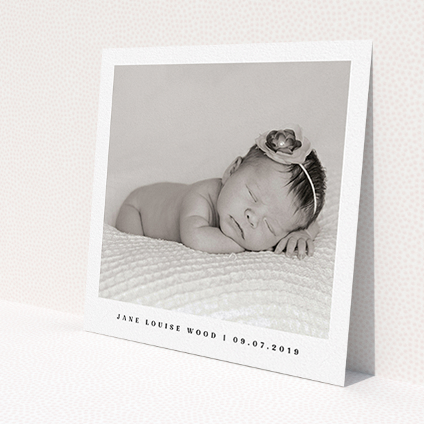 A new baby announcement card design called 'Clean portrait'. It is a square (148mm x 148mm) card in a square orientation. It is a photographic new baby announcement card with room for 1 photo. 'Clean portrait' is available as a flat card, with mainly white colouring.