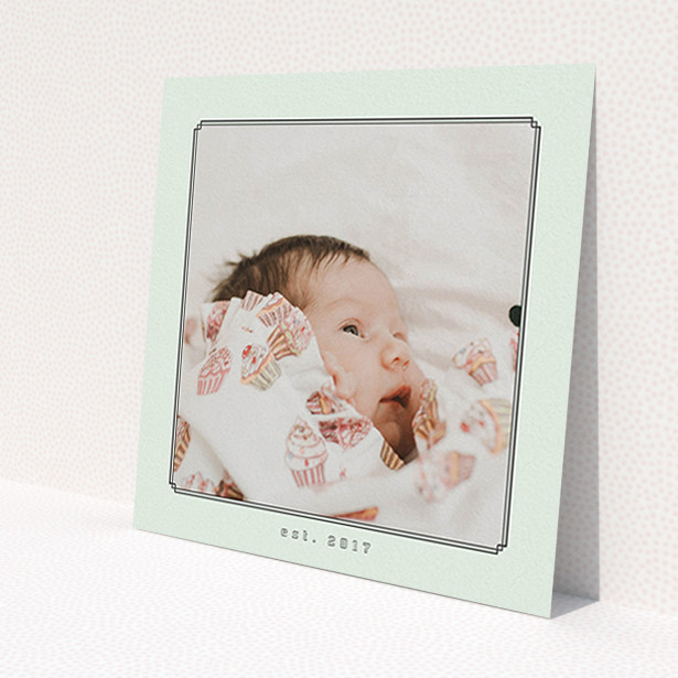 A new baby announcement card template titled 'Deco Mint Frame'. It is a square (148mm x 148mm) card in a square orientation. It is a photographic new baby announcement card with room for 1 photo. 'Deco Mint Frame' is available as a flat card, with mainly green colouring.