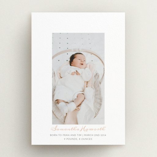 A new baby announcement card design named "Floating there". It is an A5 card in a portrait orientation. It is a photographic new baby announcement card with room for 1 photo. "Floating there" is available as a flat card, with tones of white and pink.