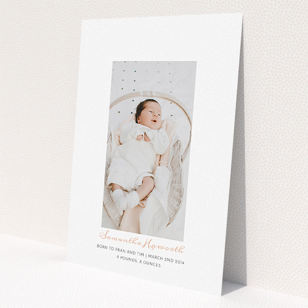 A new baby announcement card design named 'Floating there'. It is an A5 card in a portrait orientation. It is a photographic new baby announcement card with room for 1 photo. 'Floating there' is available as a flat card, with tones of white and pink.