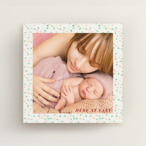 A new baby announcement card design called "Floral abstract". It is a square (148mm x 148mm) card in a square orientation. It is a photographic new baby announcement card with room for 1 photo. "Floral abstract" is available as a flat card, with tones of light cream and green.