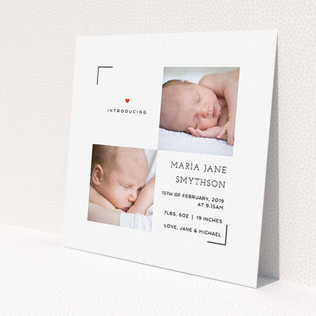A new baby announcement card design called 'Framed'. It is a square (148mm x 148mm) card in a square orientation. It is a photographic new baby announcement card with room for 2 photos. 'Framed' is available as a flat card, with tones of white and red.