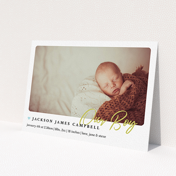 A new baby announcement card template titled 'Gold Stamp'. It is an A6 card in a landscape orientation. It is a photographic new baby announcement card with room for 1 photo. 'Gold Stamp' is available as a flat card, with tones of white and blue.