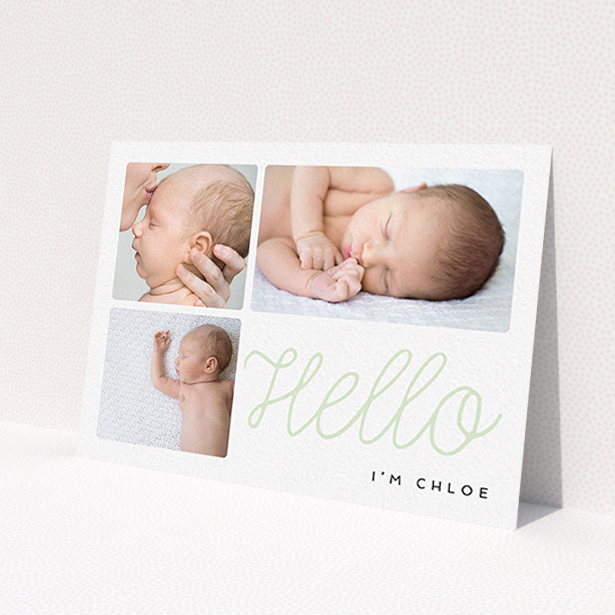 A new baby announcement card design called "Hello Cursive". It is an A6 card in a landscape orientation. It is a photographic new baby announcement card with room for 3 photos. "Hello Cursive" is available as a flat card, with tones of white and green.