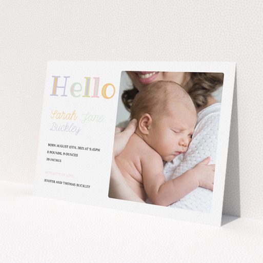 A new baby announcement card design called 'Hello Pastels'. It is an A5 card in a landscape orientation. It is a photographic new baby announcement card with room for 1 photo. 'Hello Pastels' is available as a flat card, with tones of white and green.