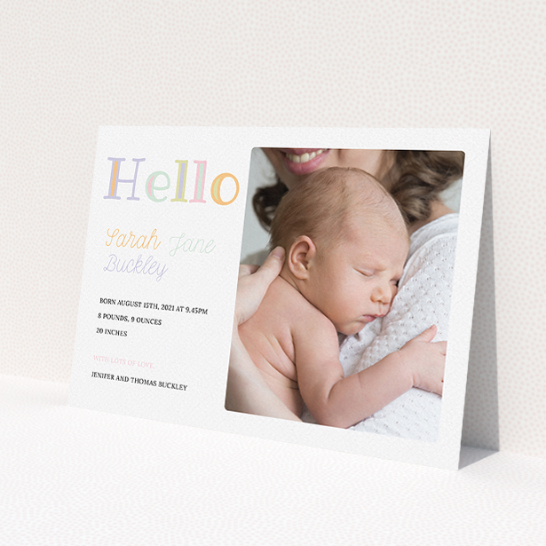 A new baby announcement card design called "Hello Pastels". It is an A5 card in a landscape orientation. It is a photographic new baby announcement card with room for 1 photo. "Hello Pastels" is available as a flat card, with tones of white and green.