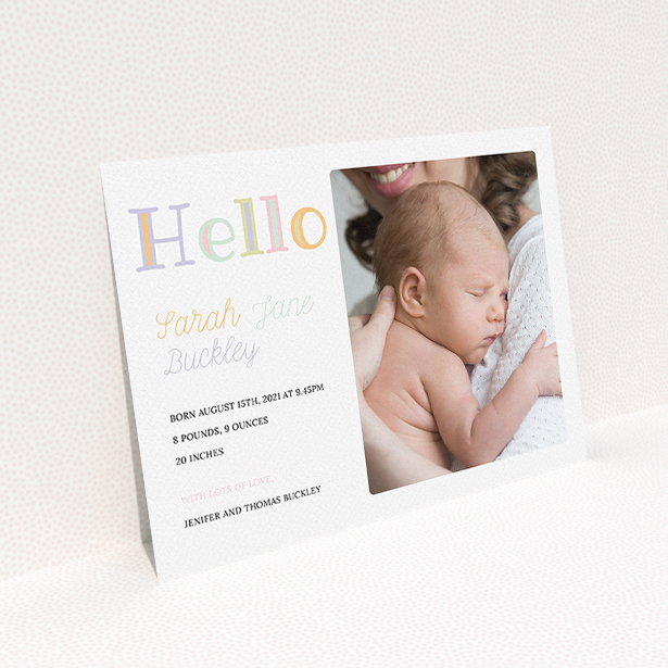 A new baby announcement card design called "Hello Pastels". It is an A5 card in a landscape orientation. It is a photographic new baby announcement card with room for 1 photo. "Hello Pastels" is available as a flat card, with tones of white and green.