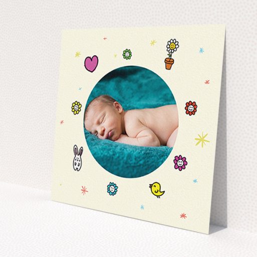 A new baby announcement card called 'Nursery Frame'. It is a square (148mm x 148mm) card in a square orientation. It is a photographic new baby announcement card with room for 1 photo. 'Nursery Frame' is available as a flat card, with tones of cream, pink and yellow.