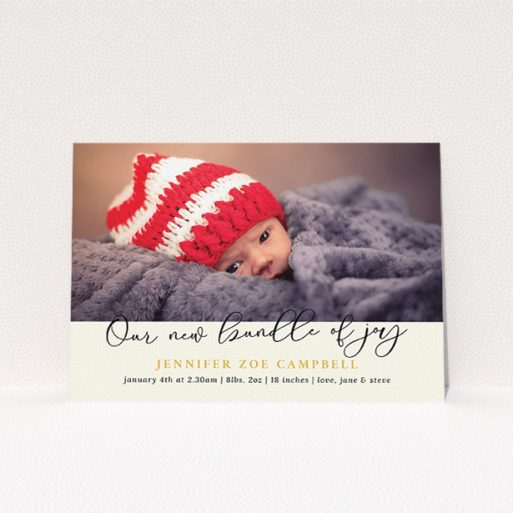A new baby announcement card named "Our New Bundle of Joy". It is an A5 card in a landscape orientation. It is a photographic new baby announcement card with room for 1 photo. "Our New Bundle of Joy" is available as a flat card, with tones of cream and gold.