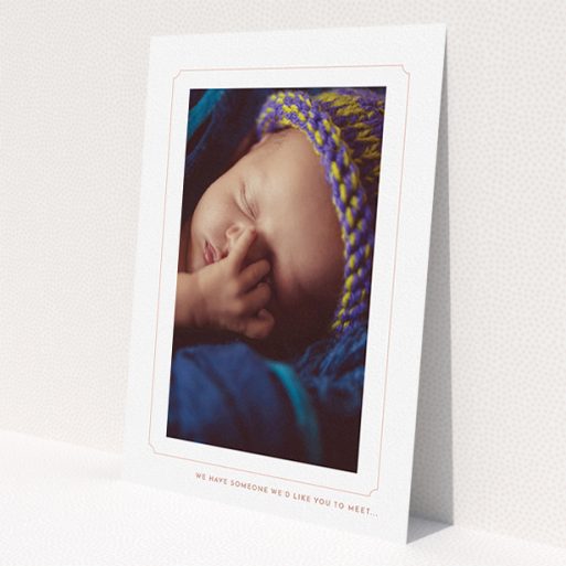 A new baby announcement card design named 'Pink notch Frame'. It is an A5 card in a portrait orientation. It is a photographic new baby announcement card with room for 1 photo. 'Pink notch Frame' is available as a flat card, with tones of white and pink.