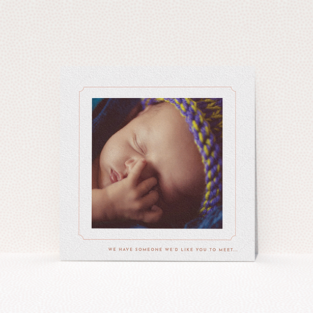 A new baby announcement card design named "Pink notch Frame". It is a square (148mm x 148mm) card in a square orientation. It is a photographic new baby announcement card with room for 1 photo. "Pink notch Frame" is available as a flat card, with tones of white and pink.
