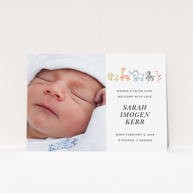 A new baby announcement card design named "Playground Safari". It is an A6 card in a landscape orientation. It is a photographic new baby announcement card with room for 1 photo. "Playground Safari" is available as a flat card, with tones of white and orange.