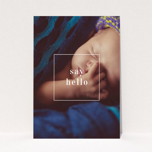 A new baby announcement card template titled "Say Hello". It is an A5 card in a portrait orientation. It is a photographic new baby announcement card with room for 1 photo. "Say Hello" is available as a flat card, with mainly white colouring.