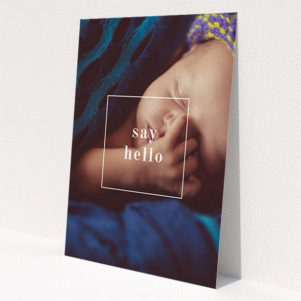 A new baby announcement card template titled 'Say Hello'. It is an A5 card in a portrait orientation. It is a photographic new baby announcement card with room for 1 photo. 'Say Hello' is available as a flat card, with mainly white colouring.