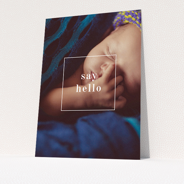 A new baby announcement card template titled "Say Hello". It is an A5 card in a portrait orientation. It is a photographic new baby announcement card with room for 1 photo. "Say Hello" is available as a flat card, with mainly white colouring.
