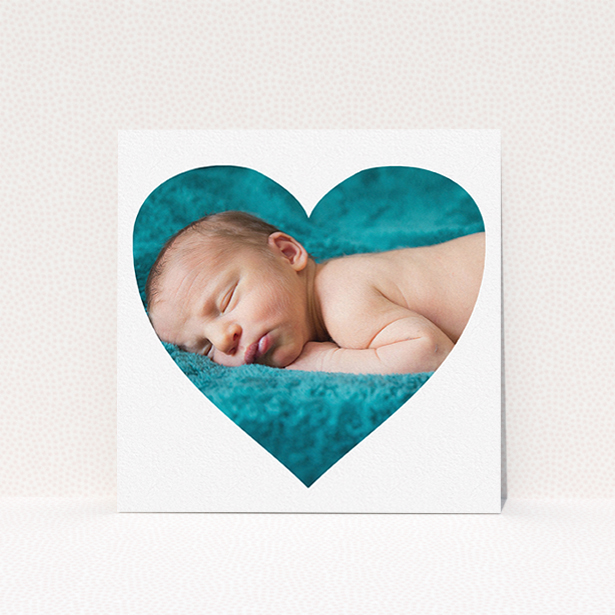 A new baby announcement card design titled "Simple Heart Frame". It is a square (148mm x 148mm) card in a square orientation. It is a photographic new baby announcement card with room for 1 photo. "Simple Heart Frame" is available as a flat card, with mainly white colouring.