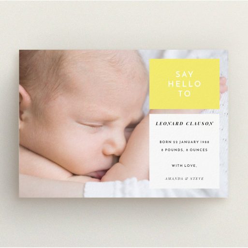 A new baby announcement card template titled "Two Frames". It is an A5 card in a landscape orientation. It is a photographic new baby announcement card with room for 1 photo. "Two Frames" is available as a flat card, with tones of yellow and white.